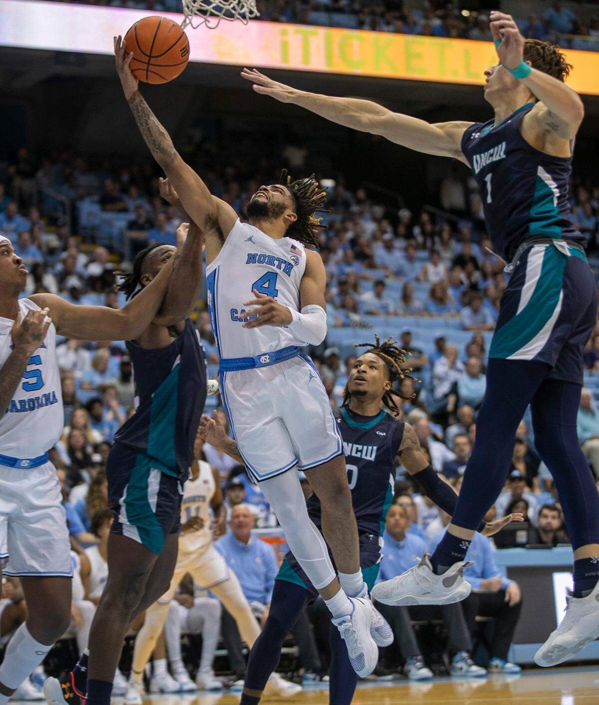 North Carolina’s R.J. Davis (4) drives to the basket for two of his game high 17 points during the second half against UNC Wilmington on Monday, November 7, 2022 at the Smith Center in Chapel Hill, N.C.
