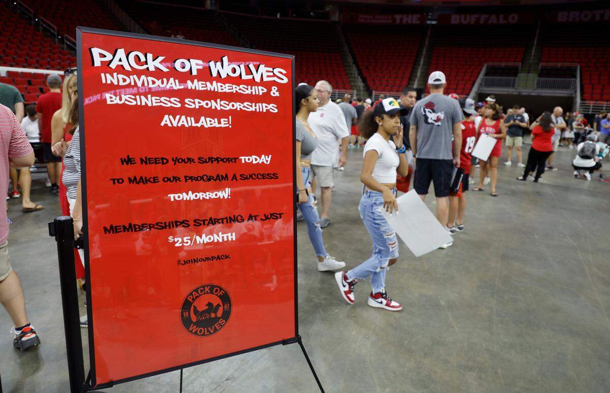 Fans attend the Pack of Wolves NIL Collective’s Meet the Pack at PNC Arena in Raleigh, N.C., Saturday, August 13, 2022.