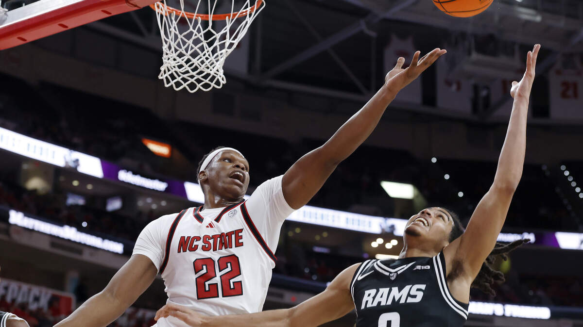 N.C. State’s Ven-Allen Lubin battles VCU’s Brandon Jennings for a rebound during the second half of the Wolfpack’s 85-79 win on Monday, Nov. 17, 2025, at the Lenovo Center in Raleigh, N.C.