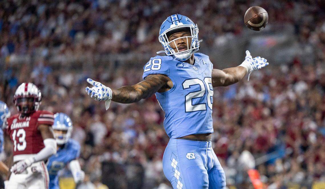 North Carolina’s Omarion Hampton (28) celebrates after scoring on a one yard run to give the Tar Heels a 24-14 lead over South Carolina in the third quarter on Saturday September 2, 2023 at Bank of America Stadium in Charlotte, N.C.