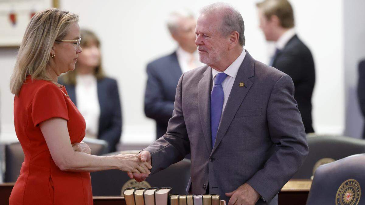 N.C. Sen. leader Phil Berger talks with Sen. Amy Galey on the first day of the General Assembly’s short session in Raleigh, Tuesday, April 21, 2026.