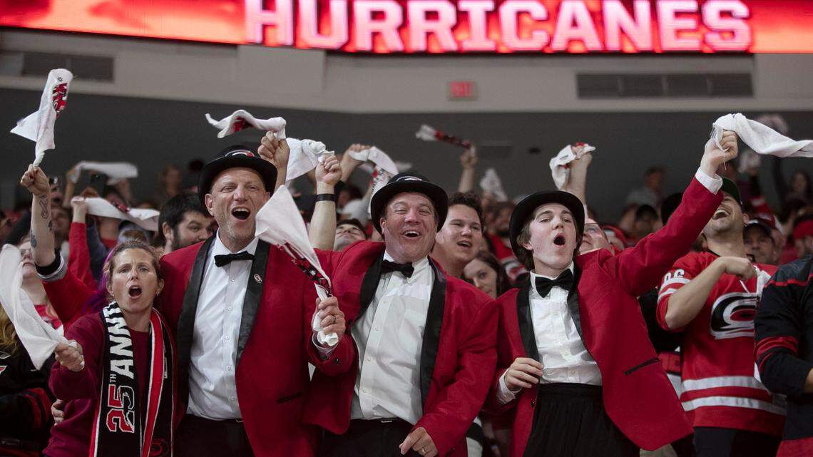 Carolina Hurricanes fans celebrate after the goal by Jalen Chatfield (5) to take a 1-0 lead over the Florida Panthers in the first period during Game 2 of the Eastern Conference Finals on Saturday, May 20, 2023 at PNC Arena in Raleigh, N.C.