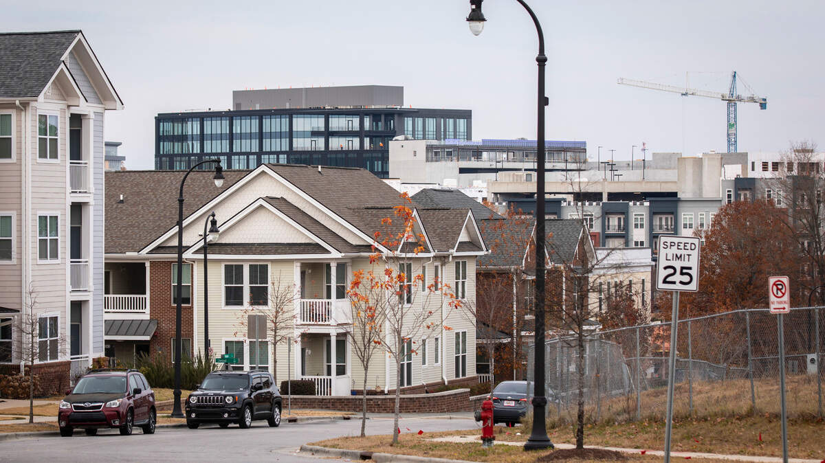 Construction in downtown Durham, N.C. can be seen from the Southside neighborhood on Dec. 6, 2021.