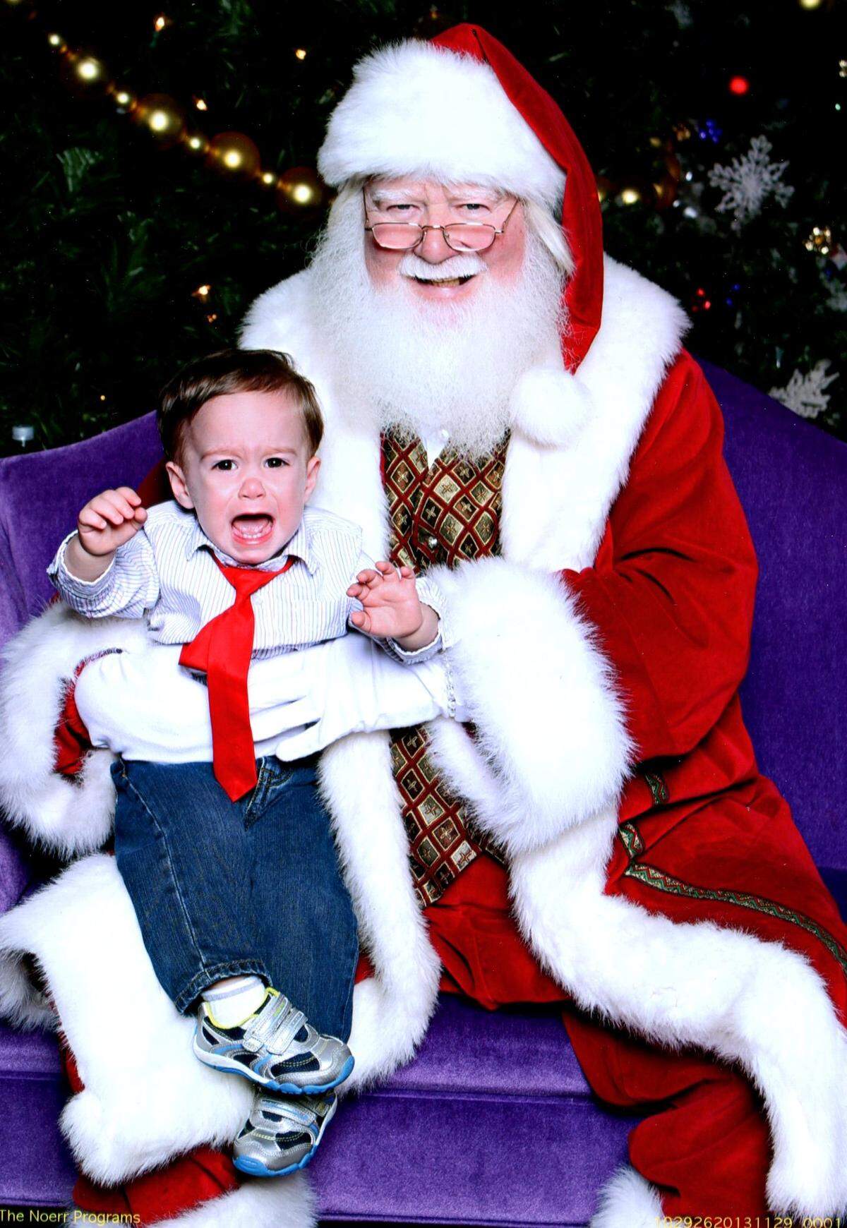 Emily Anziano’s son with Santa.