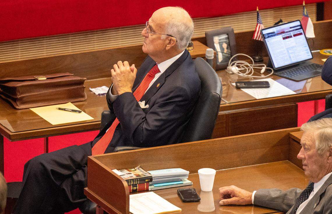 Rep. Ted Davis, a Republican from Wilmington, listens to debate on the House floor prior to voting to override Gov. Roy Cooper’s veto of an abortion restriction bill Tuesday, May 16, 2023, at the Legislative Building in Raleigh, N.C.