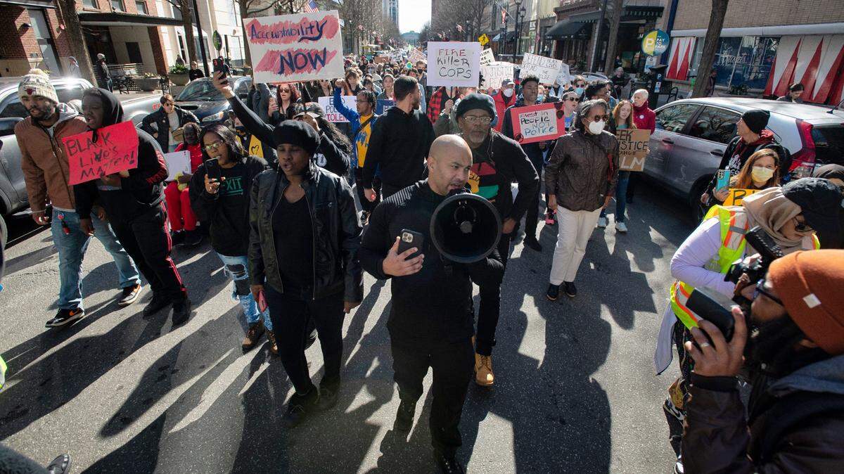 Protesters calling for an end to police brutality and other changes in policing march north on Fayetteville Street in downtown Raleigh, N.C., Saturday afternoon, Jan. 28, 2023.
