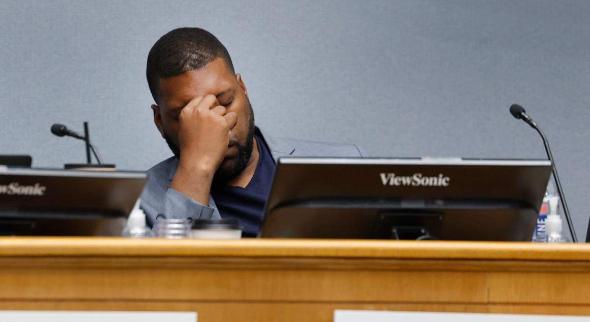 Durham city council member Leonardo Williams listens to the council debate bonuses for sanitation workers during a council work session at City Hall in Durham, N.C., Thursday, Sept. 7, 2023.