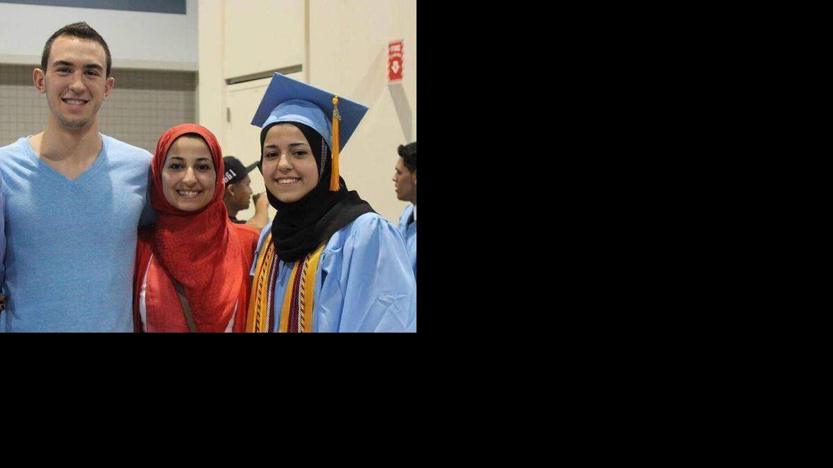 Deah Barakat, 23, (left) his wife Yusor Abu-Salha, 21, (center) and Abu-Salha’s sister, Razan Abu-Salha, 19, of Raleigh.
