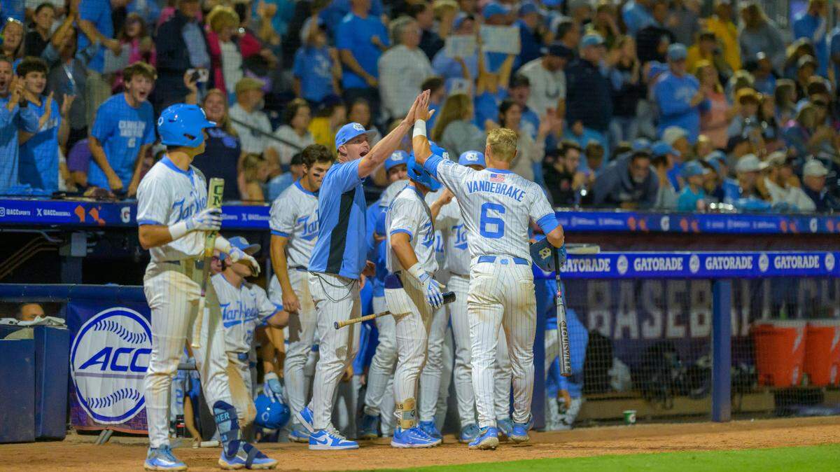 UNC’s dugout celebrates with second baseman Jackson Van De Brake during the Tar Heels’ 7-2 comeback win over Boston College in the ACC Tournament quarterfinals on Friday, May 23, 2025, at Durham Bulls Athletic Park in Durham, N.C.