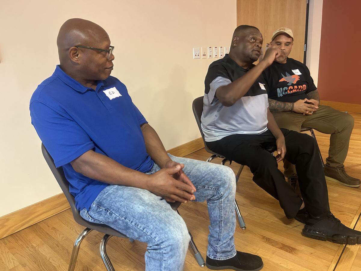 Henry McCollum (center) talks about being a death row exoneree at an event at Pullen Memorial Baptist Church in Raleigh, N.C. on Aug. 16, 2025 organized by the N.C. Coalition for Alternatives to the Death Penalty. Beside him are fellow death row exonerees Ed Chapman and Alfrred Rivera.