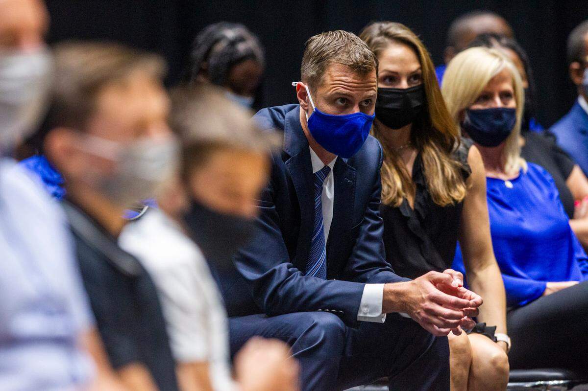 Duke associate head coach Jon Scheyer listens as head basketball coach Mike Krzyzewski announces his retirement at the conclusion of the 2021-22 season during a press conference at Cameron Indoor Stadium Thursday, June 3, 2021. Scheyer will be the coach-in-waiting before taking over the program as its next head coach in 2022, Duke announced on Wednesday.