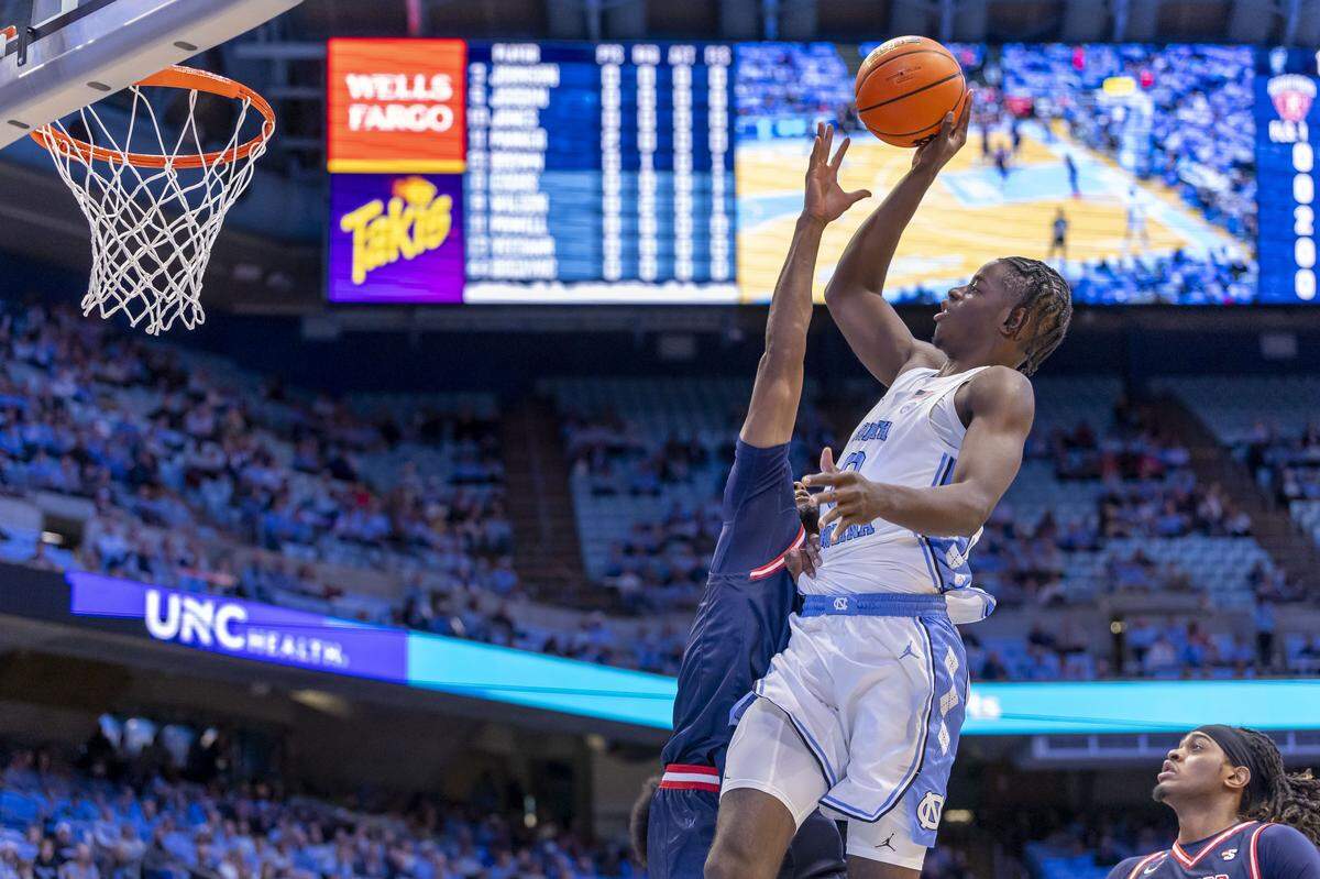 North Carolina forward Caleb Wilson (8) drives to the basket against Radford guard Mari Jordan (5) in the first half on Tuesday, November 11, 2025 at the Smith Center in Chapel Hill, N.C.