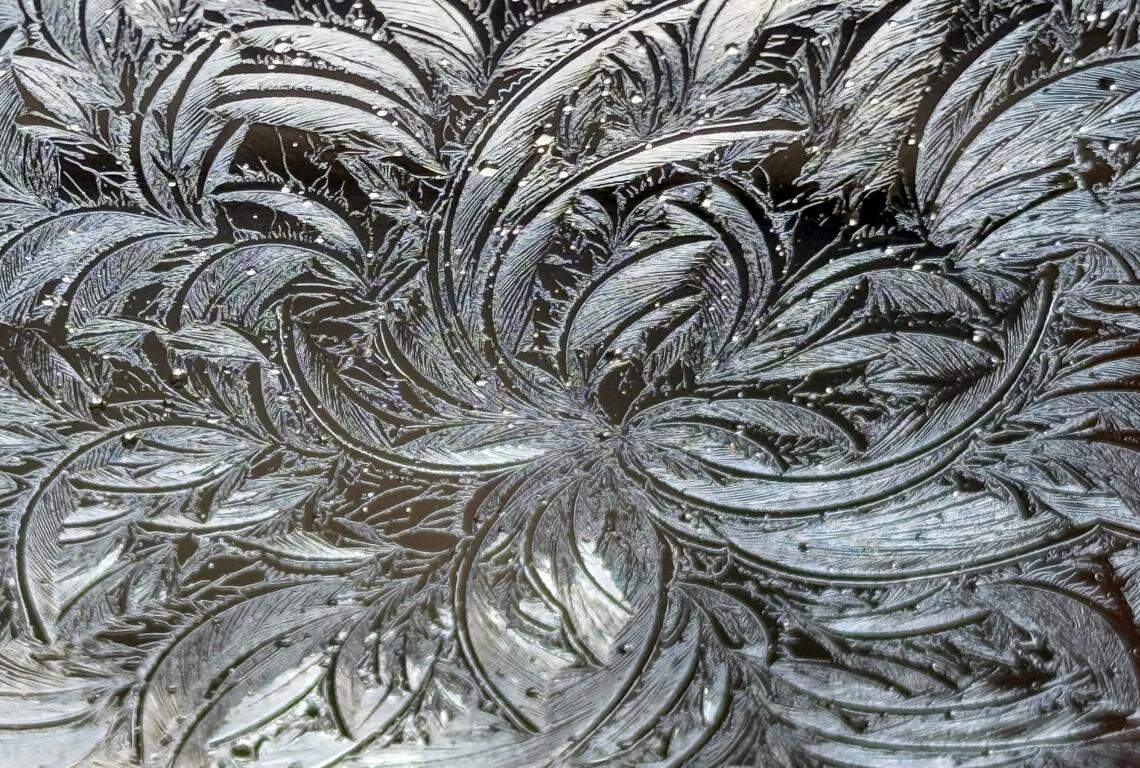 Ice as seen through a car window in Raleigh, N.C., Saturday, Jan. 11, 2025.