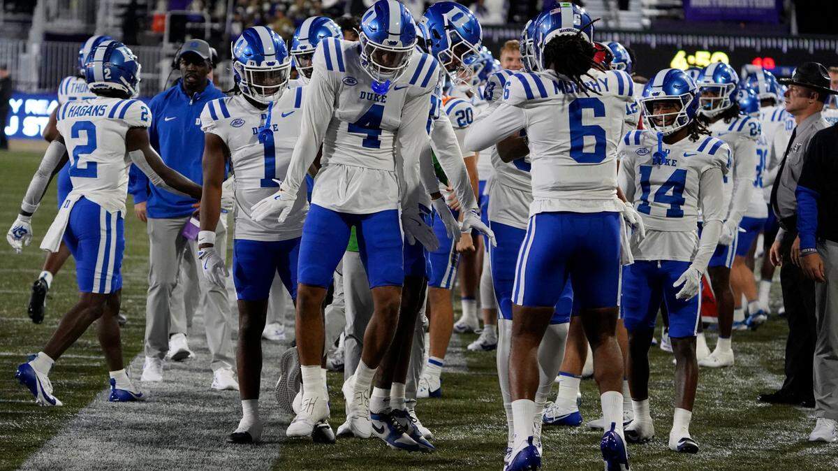 Duke Blue Devils wide receiver Eli Pancol (4) celebrates his touchdown against the Northwestern Wildcats during the first half at Lanny and Sharon Martin Stadium.