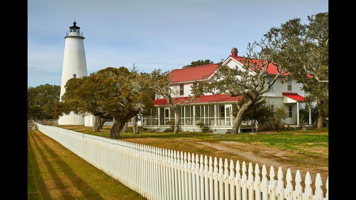 The Ocracoke Light Station complex at Cape Hatteras National Seashore includes the Ocracoke Lighthouse, Double Keepers’ Quarters and several other structures.