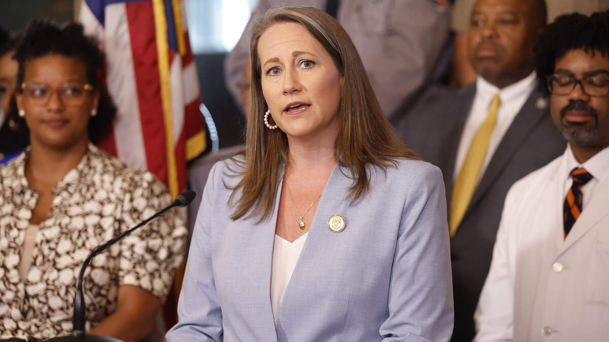 Leslie Dismukes, secretary of the N.C. Department of Adult Correction, speaks during a ceremony before Gov. Josh Stein signed the state budget at the Executive Mansion in Raleigh, N.C., Tuesday, July 7, 2026.