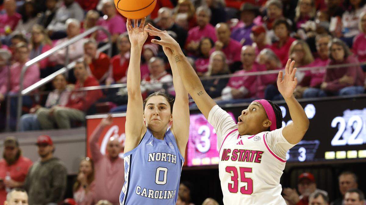 North Carolina’s Lanie Grant is fouled by N.C. State’s Zoe Brooks during the first half of the Tar Heels’ 61-59 win on Monday, Feb. 2, 2026, at Reynolds Coliseum in Raleigh, N.C.