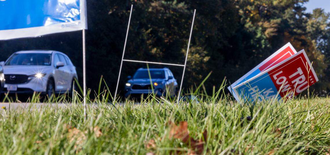 Political signs, damaged or missing, along High House Road near Bond Park on Thursday, October 31, 2024 in Cary, N.C.