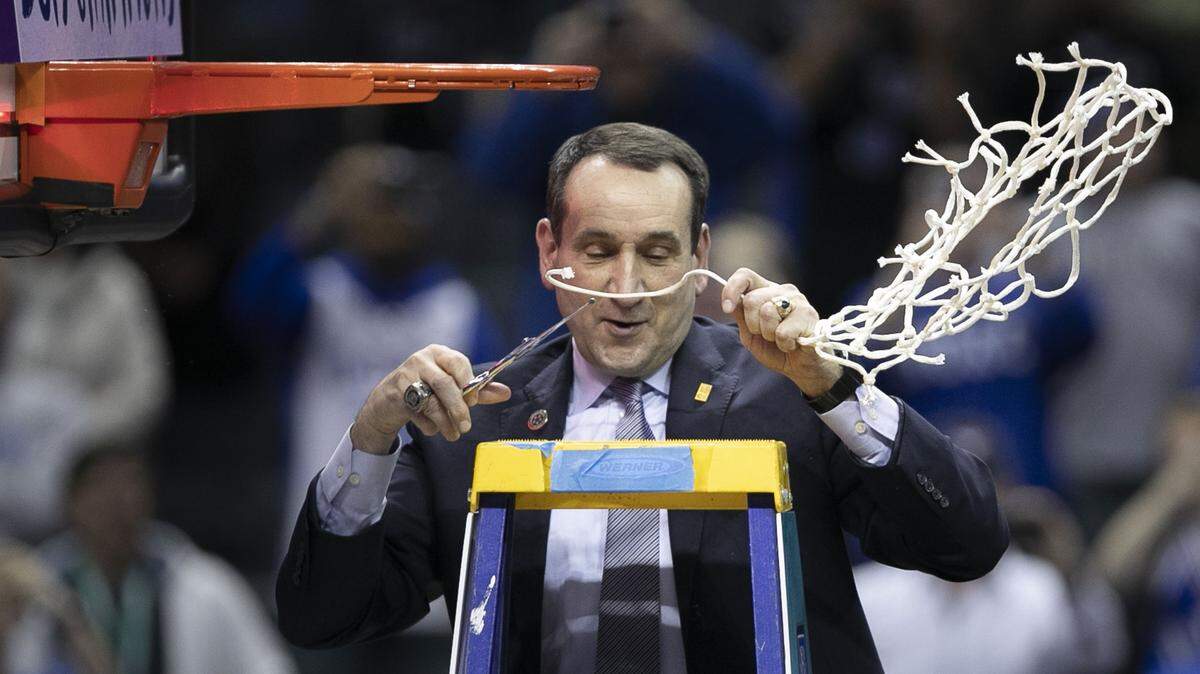 Duke coach Mike Krzyzewski cuts down the net after Blue Devils’ clinched the ACC Tournament championship game with a 73-63 victory over Florida State on Saturday, March 16, 2019 at the Spectrum Center in Charlotte, N.C.