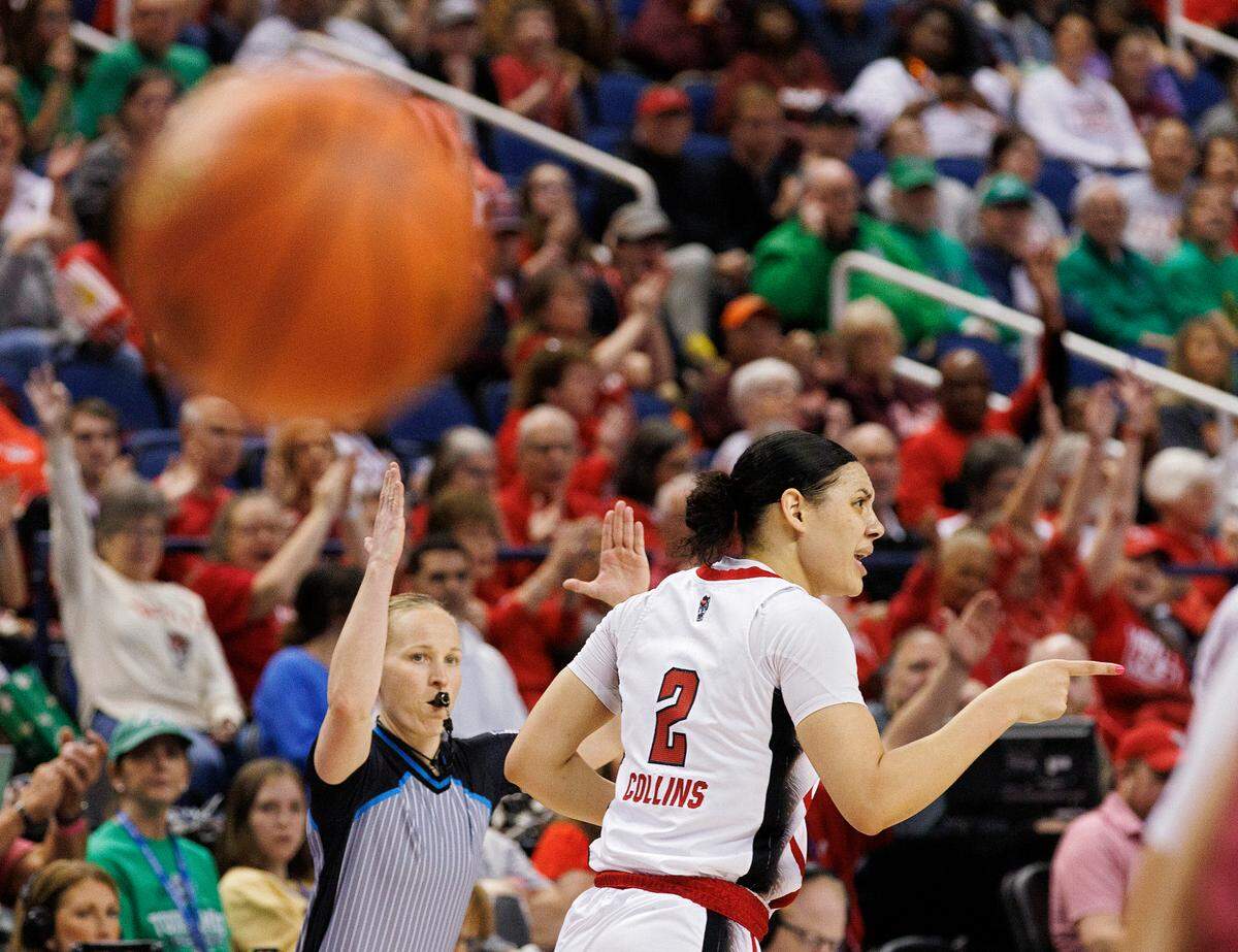 N.C. State’s Mimi Collins reacts after knocking down a three-point basket during the first half of the Wolfpack’s 69-43 win over Florida State in the ACC Tournament semifinals on Saturday, March 9, 2024, at Greensboro Coliseum in Greensboro, N.C.