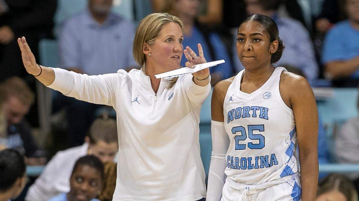 North Carolina coach Courtney Banghart talks with Deja Kelly (25) during their game against Jackson State on Wednesday, November 9, 2022 at Carmichael Arena in Chapel Hill, N.C. On Saturday, March 18, Kelly led the Tar Heels to a first-round NCAA Tournament win over St. John's.