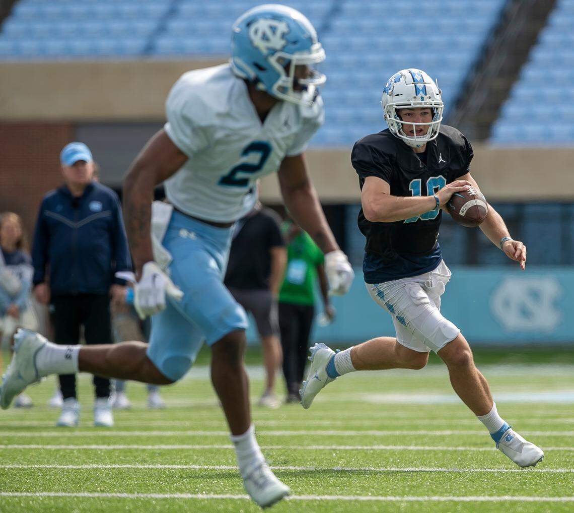 North Carolina quarterback Drake Maye (10) runs the ball during a scrimmage at the Tar Heels’ open practice on Saturday, March 25, 2023 at Kenan Stadium in Chapel Hill. N.C.