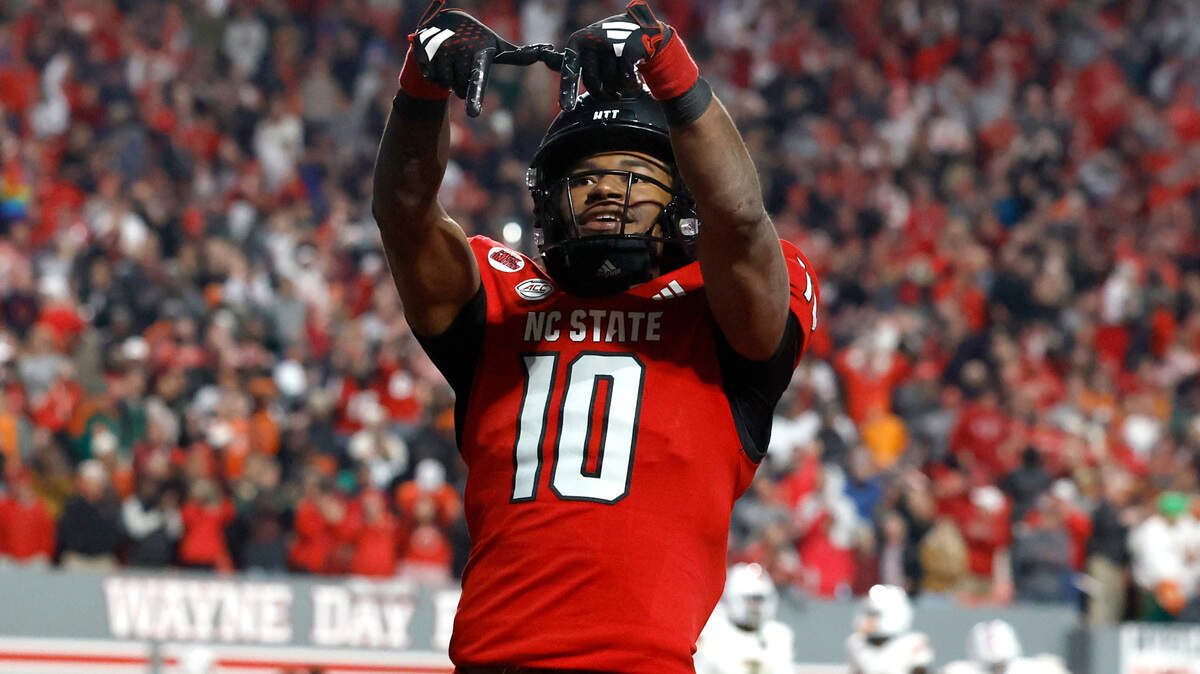 N.C. State wide receiver KC Concepcion (10) celebrates after Kendrick Raphael scored on a 31-yard touchdown run during the Wolfpack’s 20-6 victory over Miami at Carter-Finley Stadium in Raleigh, N.C., Saturday, Nov. 4, 2023.
