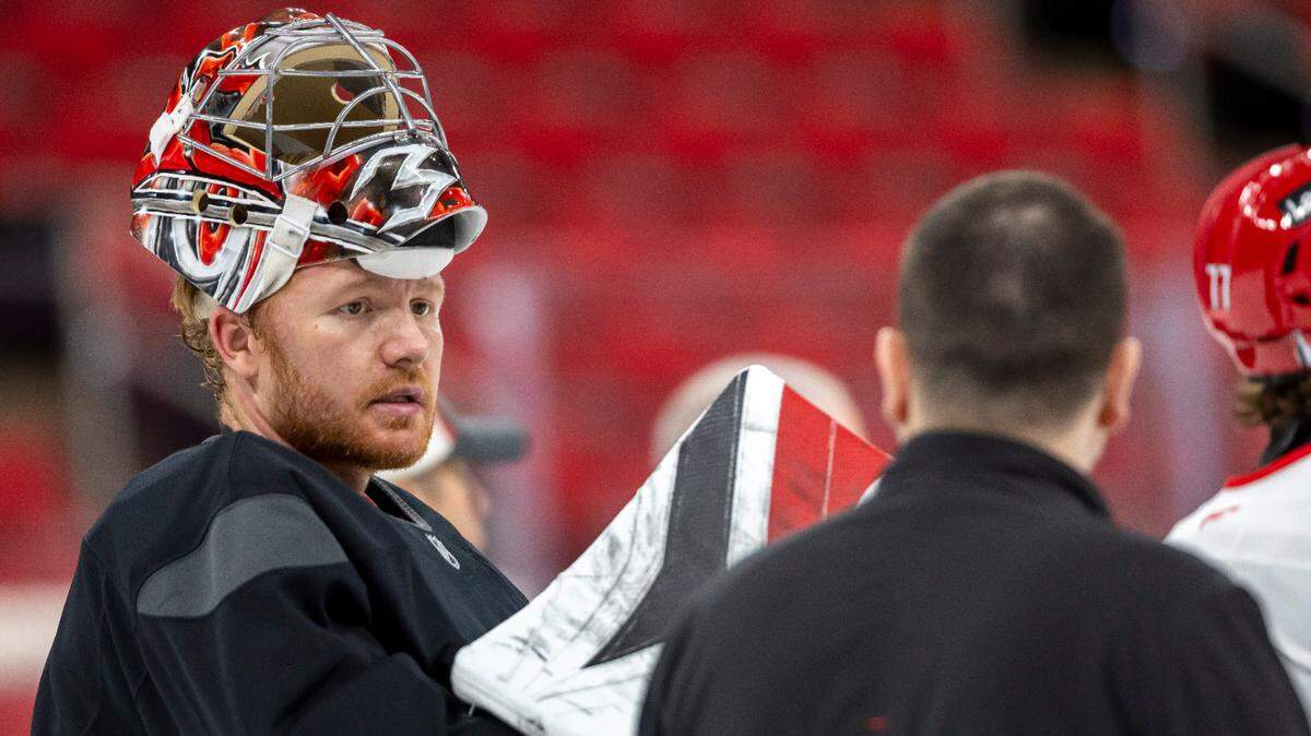 Carolina Hurricanes goalie Frederik Andersen (31) talks with goaltending coach Paul Schonfelder during their practice on Friday, May 2, 2025 at Lenovo Center in Raleigh, N.C.