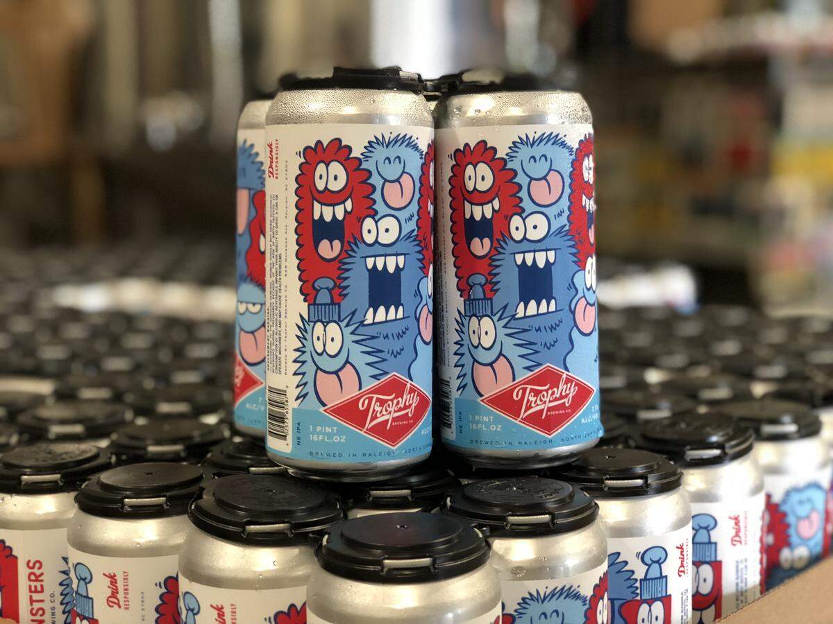 Kevin Lyons has painted "Morgan Street Jazz Monsters: A Tribute to the Jazz Giants of North Carolina," a mural with his signature monsters on the side of Trophy Brewing.  Trophy has brewed up a "Morgan Monsters" New England IPA to go with the mural. Lyons designed the label.