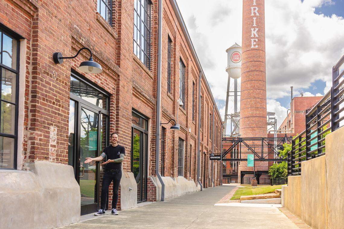 Lutra Cafe and Bakery owner Chris McLaurin stands outside the American Tobacco Campus space his business will occupy.