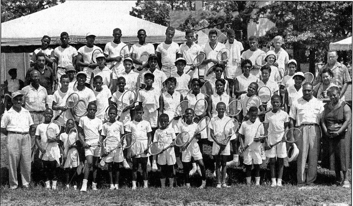 Young tennis players photographed at the Algonquin Tennis Club in 1954. Future tennis great Arthur Ashe is on the front row, 5th from right.