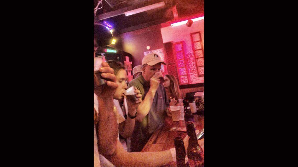 ECU interim chancellor Dan Gerlach has been placed on leave pending further investigation after photos and videos surfaced of him apparently chugging beer at a Greenville, NC bar.