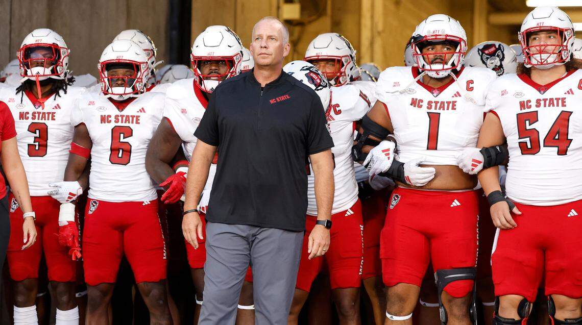 N.C. State head coach Dave Doeren gets ready to lead the team onto the field before the Wolfpack’s game against UConn at Rentschler Field in East Hartford, Conn. Thursday, August 31, 2023.