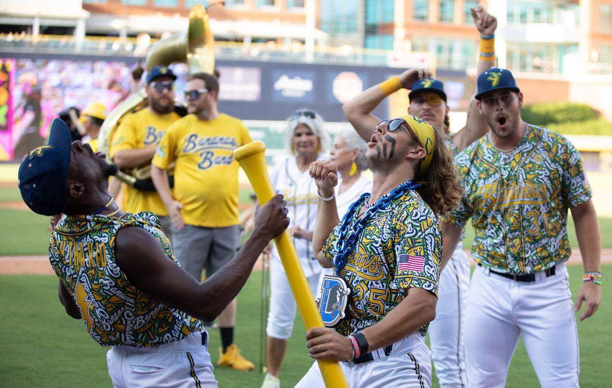 The Savannah Bananas take the field ahead of their game at Durham Bulls Athletic Park in Durham, N.C. on Friday, July 14, 2023.
