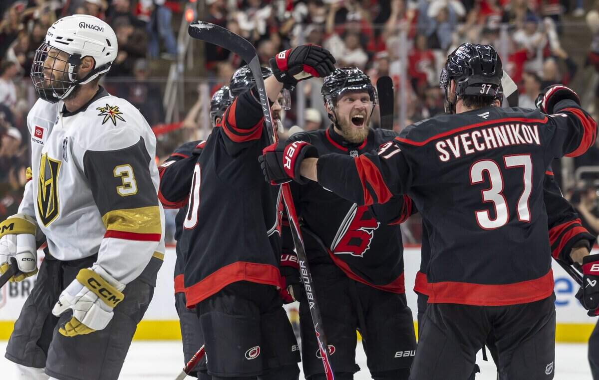 Carolina Hurricanes left wing Nikolaj Ehlers (27) greets Carolina Hurricanes right wing Andrei Svechnikov (37) after his goal to give the Hurricanes a 4-1 lead in the third period in Game 5 of the Stanley Cup Final against Vegas, on Thursday, June 11, 2026 at Lenovo Center in Raleigh, N.C.