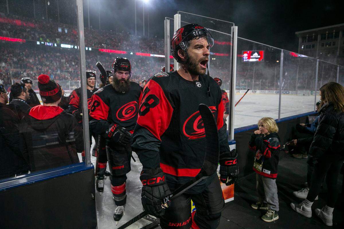 Carolina Hurricanes’ Jordan Martinook (48) acknowledges fans as he leaves the ice following their 4-1 victory over the Washington Capitals in the Stadium Series game on Saturday, February 18, 2022 at Carter-Finley Stadium in Raleigh, N.C.