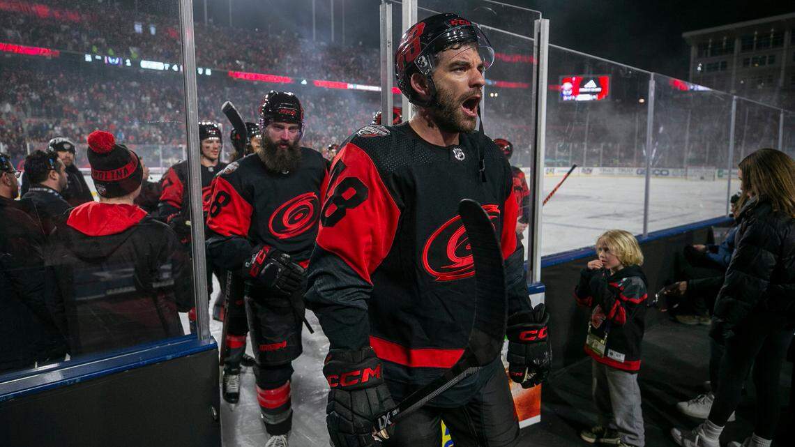 Carolina Hurricanes’ Jordan Martinook (48) acknowledges fans as he leaves the ice following their 4-1 victory over the Washington Capitals in the Stadium Series game on Saturday, February 18, 2022 at Carter-Finley Stadium in Raleigh, N.C.