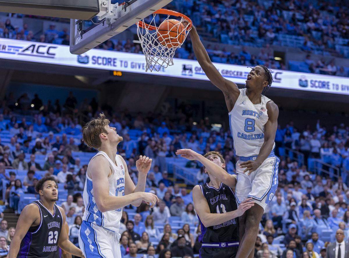 North Carolina forward Caleb Wilson (8) dunks over Central Arkansas guard Parker Applegate (13) in the second half on Monday, November 3, 2025 at the Smith Center in Chapel Hill, N.C. Wilson lead all scores with 22 points in the Tar Heels’ 94-54 victory.
