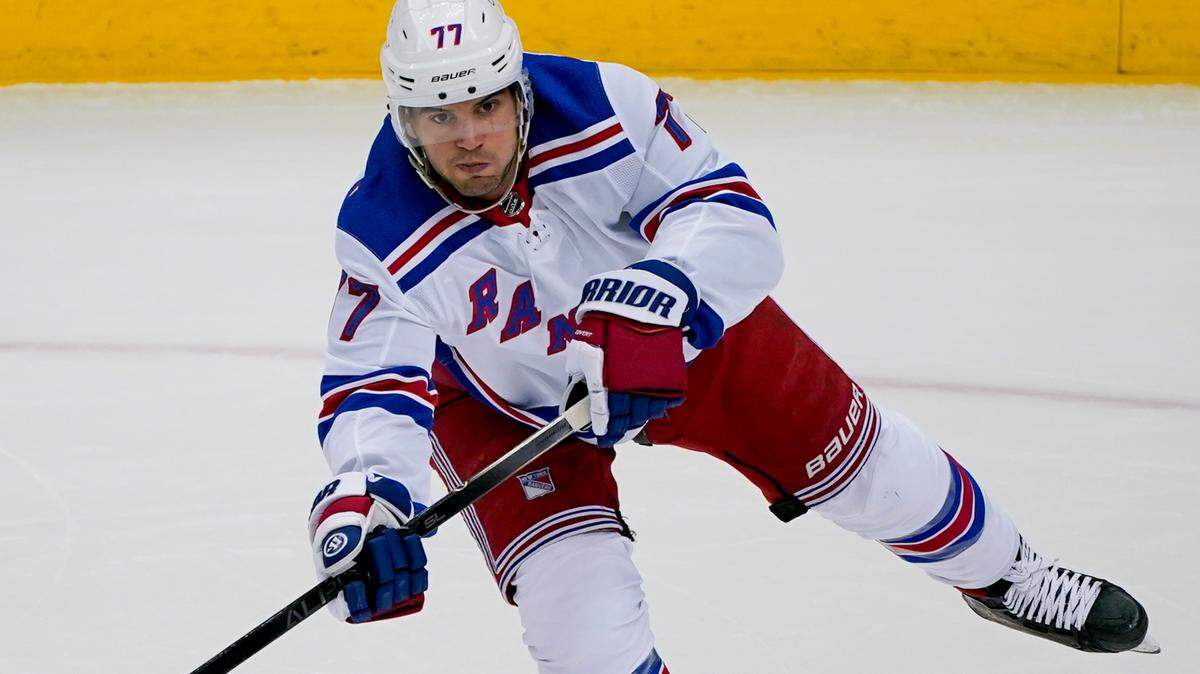 New York Rangers’ Tony DeAngelo gets off a pass during the first period of an NHL hockey game against the Pittsburgh Penguins in Pittsburgh. General manager Jeff Gorton says DeAngelo has played his final game for the Rangers despite going unclaimed on waivers. Gorton said the 25-year-old defenseman will not be around the team after an undisclosed “incident.” (AP Photo/Gene J. Puskar, File)