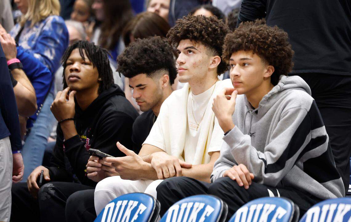 From left, Duke signees Shelton Henderson, Cayden Boozer, his brother Cameron Boozer and recruit Nate Ament watch before Duke’s game against UNC at Cameron Indoor Stadium in Durham, N.C., Saturday, Feb. 1, 2025.
