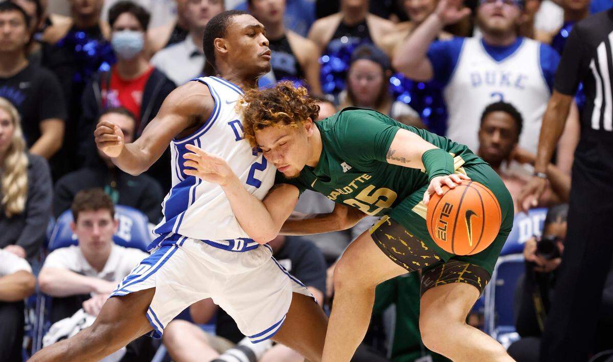 Duke’s Jaylen Blakes (2) defends Charlotte’s Lu’Cye Patterson (25) during the second half of Duke’s 80-56 victory over Charlotte at Cameron Indoor Stadium in Durham, N.C., Saturday, Dec. 9, 2023.