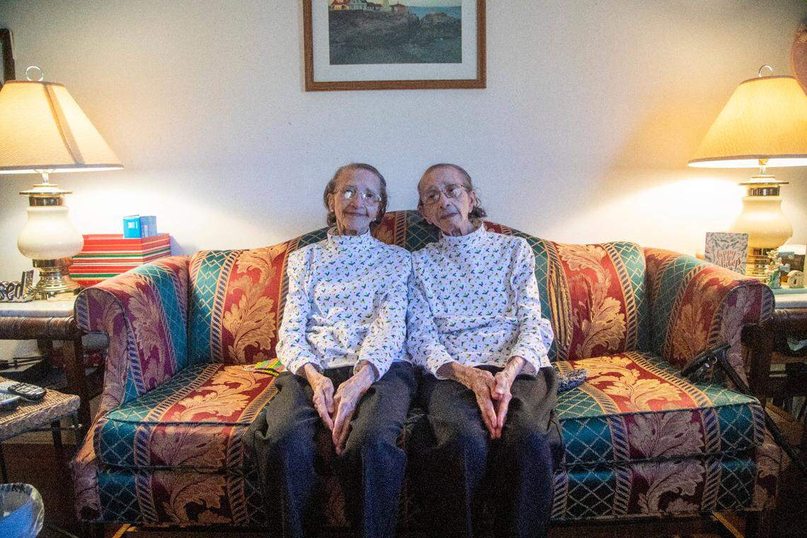 Identical twins and Raleigh natives Kathleen Stephenson, left, and Alean Chavis will celebrate their one hundredth birthday on New Years Eve.