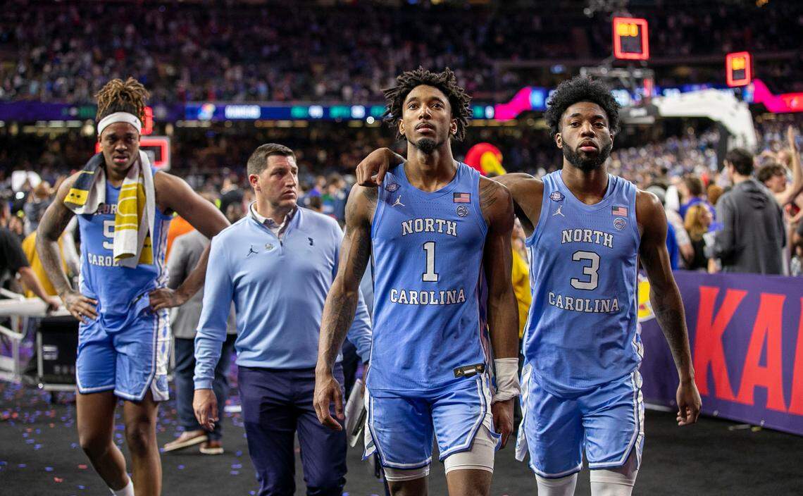 North Carolina’s Armando Bacot (5), Leaky Black (1) and Dontrez Styles (3) leave the court following the the Tar Heels’ 72-69 loss to Kansas in the NCAA Championship game on Monday, April 4, 2022 at Caesars Superdome in New Orleans, La.