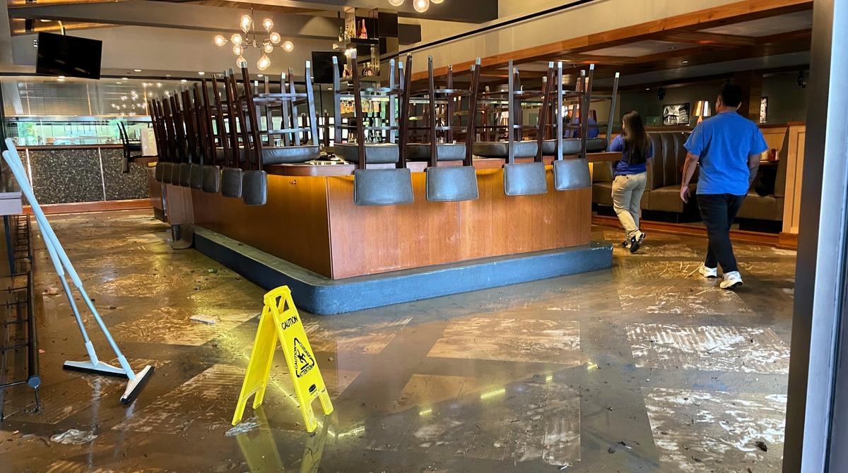 Floodwaters flowed quickly into Stoney River restaurant at University Place on Sunday, July 6, 2025, as staff evacuated diners around 7:30 p.m. Chapel Hill business owners and residents said it was just a regular storm until it wasn’t Sunday, and the water rose fast.