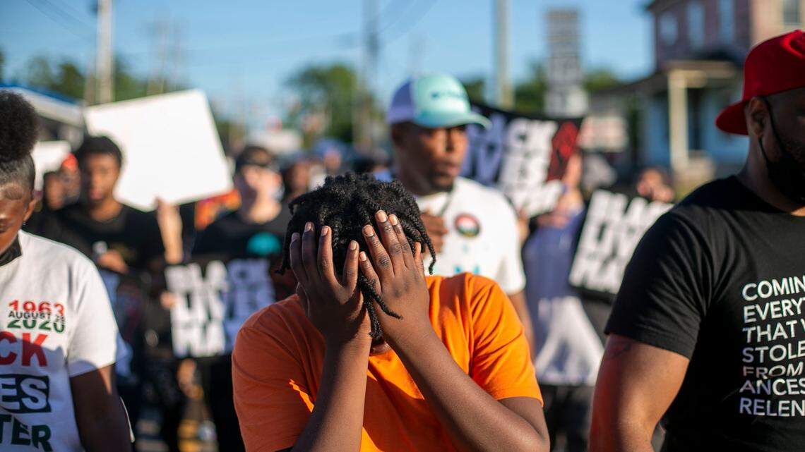Demonstrators cross Main Street calling for justice in the Andrew Brown Jr. case on Friday, May 21, 2021 in Elizabeth City, N.C. Demonstrators have marched for more than 30 days following the death of Andrew Brown Jr. at the hands of Pasquotank County deputies who were serving an arrest warrant last month.