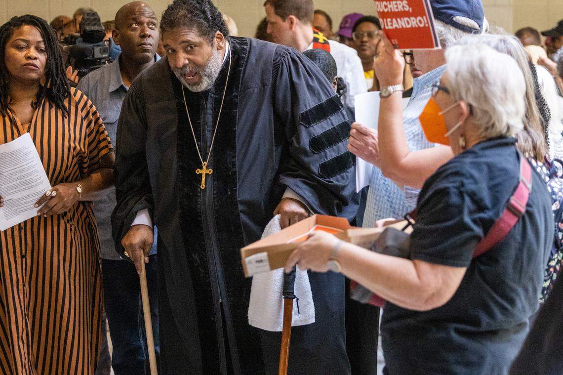 The Rev. William Barber II leads a rally of more than 100 demonstrators between entrances to the House and Senate chambers at the Legislative Building in Raleigh on May 24, 2023. Barber is founder and president of Repairers of the Breach, a non-profit social justice and anti-poverty advocacy group.