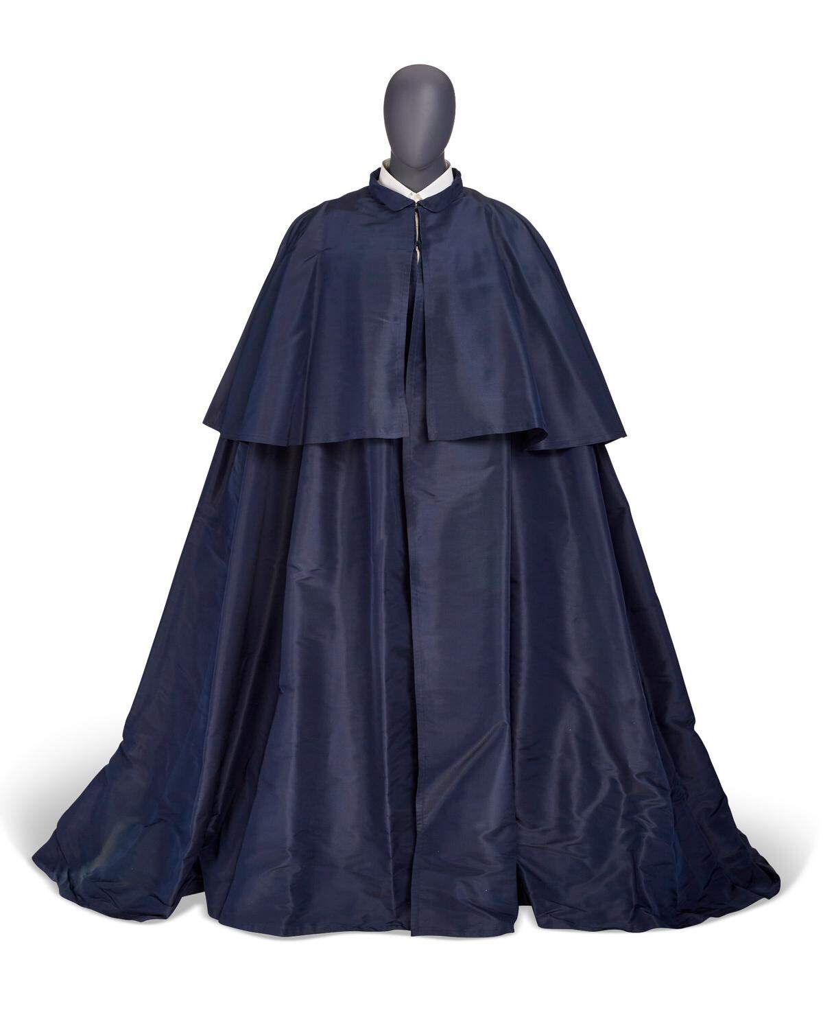 A navy silk cape that was owned by André Leon Talley is designed by Chanel, circa 2000 to 2020. It will be sold at an auction of Talley’s collection.