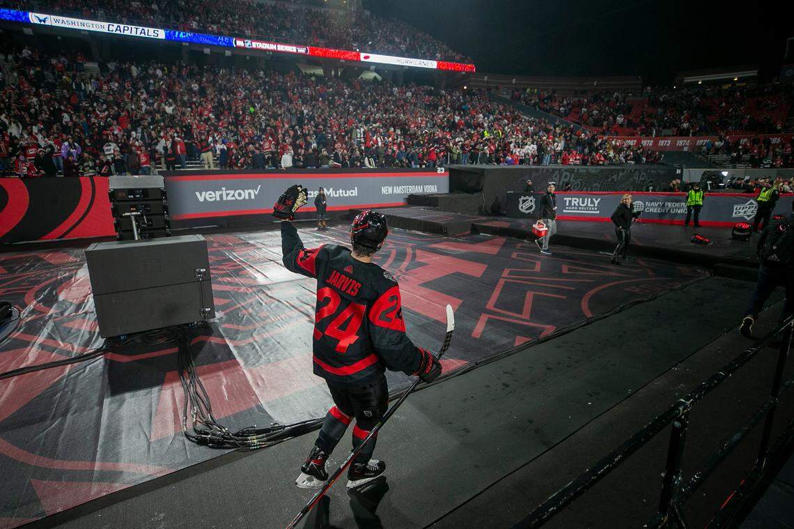 Carolina Hurricanes’ Seth Jarvis (24) waves to fans as he leaves the ice following their 4-1 victory over the Washington Capitals in the Stadium Series game on Saturday, February 18, 2022 at Carter-Finley Stadium in Raleigh, N.C.