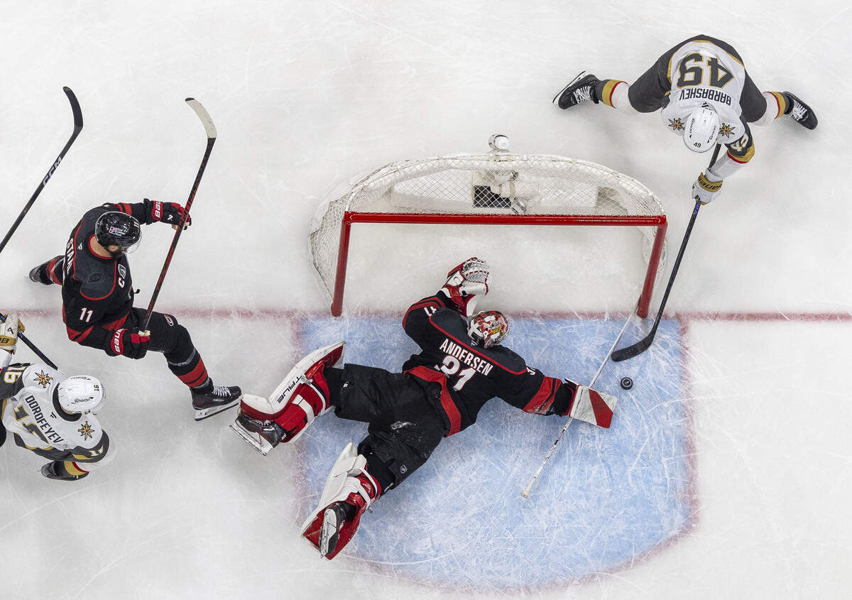 Carolina Hurricanes goalie Frederik Andersen (31) stops a scoring attempt by Vegas left wing Ivan Barbashev (49) in the second period of Game 2 of the Stanley Cup Final, on Thursday, June 4, 2026 at Lenovo Center in Raleigh, N.C.