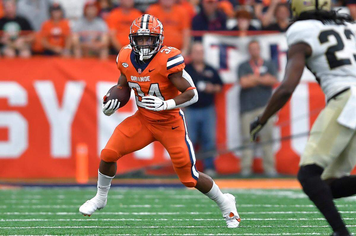 Syracuse running back Sean Tucker runs with the ball during the first half of an NCAA college football game against Purdue in Syracuse, N.Y., Saturday, Sept. 17, 2022.